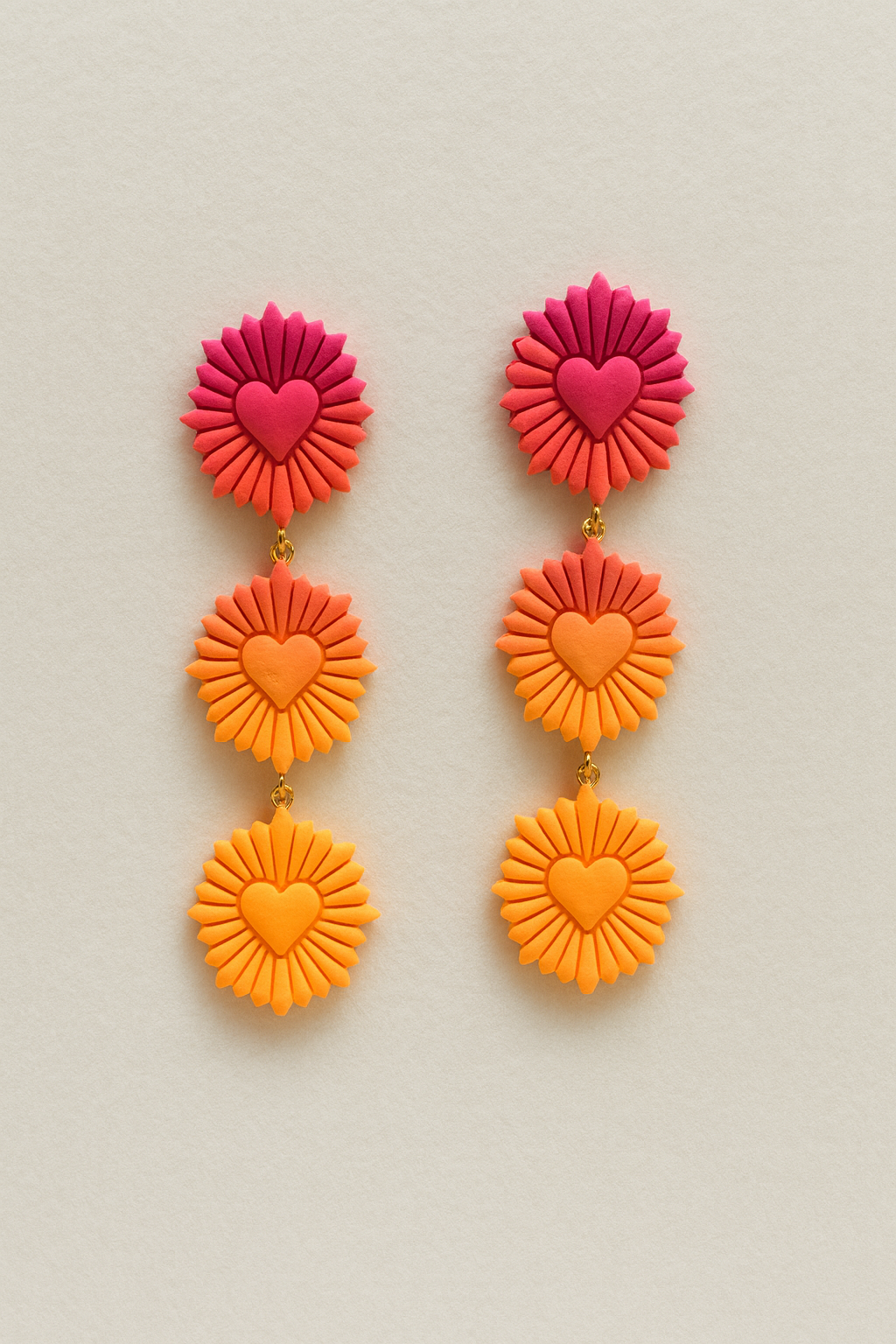 2 Aretes Corazón Radiante