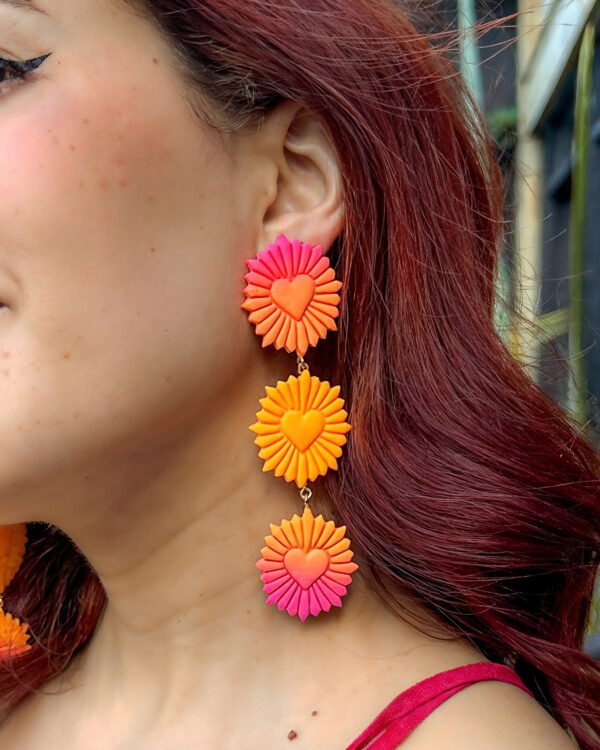 UniversalUpscaler_a2557149-7d9a-48b8-8d62-ad5966cd8a11 Aretes Corazón Radiante